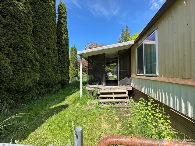 11615 Nisqually Park Loop SE, Olympia, WA 98513 - view of yard featuring a deck and a sunroom