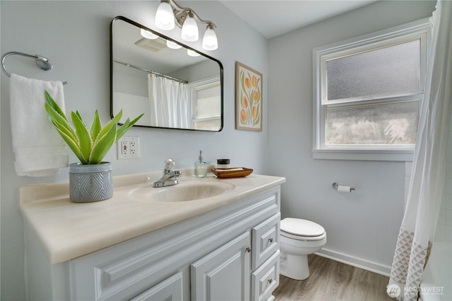 1108 116th St S, Tacoma, WA 98444 - bathroom featuring vanity, wood finished floors, and a shower with curtain