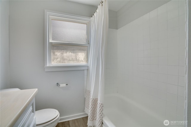 1108 116th St S, Tacoma, WA 98444 - bathroom featuring wood finished floors, shower / bath combo, and vanity