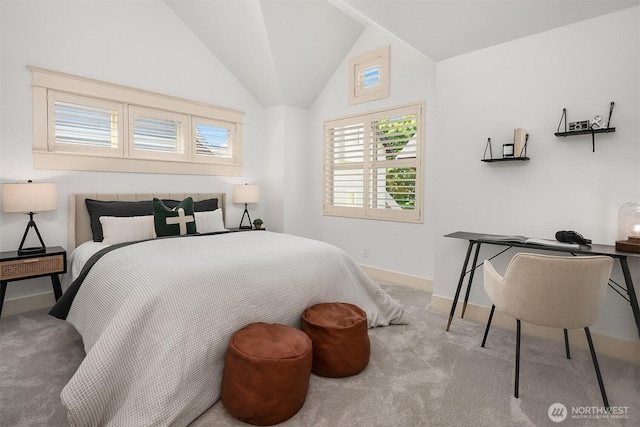 3122 Franklin Ave E Unit A, Seattle, WA 98102 - bedroom featuring carpet flooring, multiple windows, baseboards, and lofted ceiling