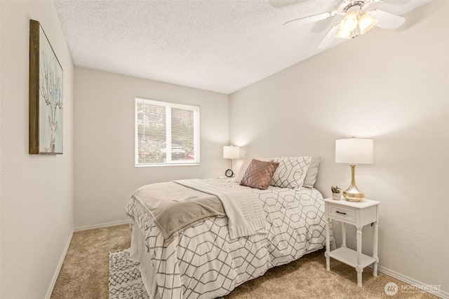 615 75th St SE Unit C-44, Everett, WA 98203 - carpeted bedroom featuring baseboards, a textured ceiling, and ceiling fan