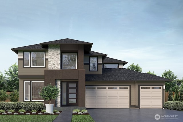 13665 197th Ave SE, Monroe, WA 98272 - view of front of home with driveway, an attached garage, a shingled roof, and stone siding