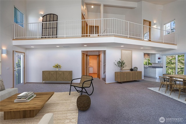 4270 US Highway 97a, Chelan, WA 98816 - carpeted living area featuring a high ceiling and stairway