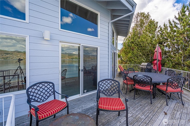 4270 US Highway 97a, Chelan, WA 98816 - wooden terrace featuring outdoor dining space and a grill