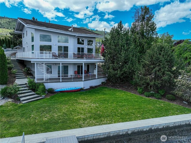 4270 US Highway 97a, Chelan, WA 98816 - back of property with stairs and a yard