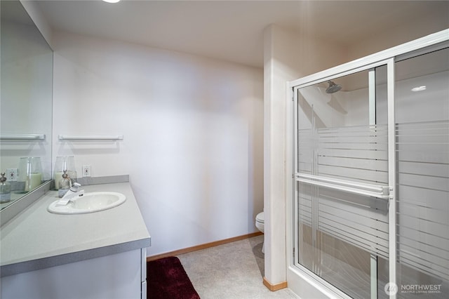 4270 US Highway 97a, Chelan, WA 98816 - bathroom with vanity, a shower stall, toilet, and baseboards
