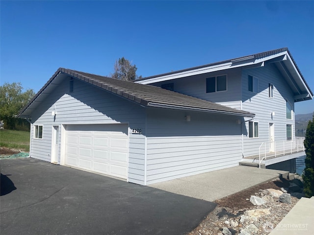 4270 US Highway 97a, Chelan, WA 98816 - view of property exterior with a garage