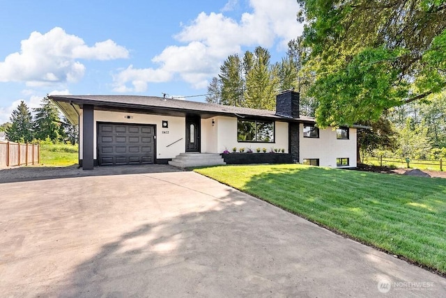 11433 SE 244th St, Kent, WA 98030 - view of front of home featuring a chimney, driveway, an attached garage, and stucco siding