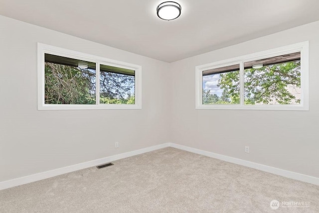 11433 SE 244th St, Kent, WA 98030 - unfurnished room with baseboards and carpet