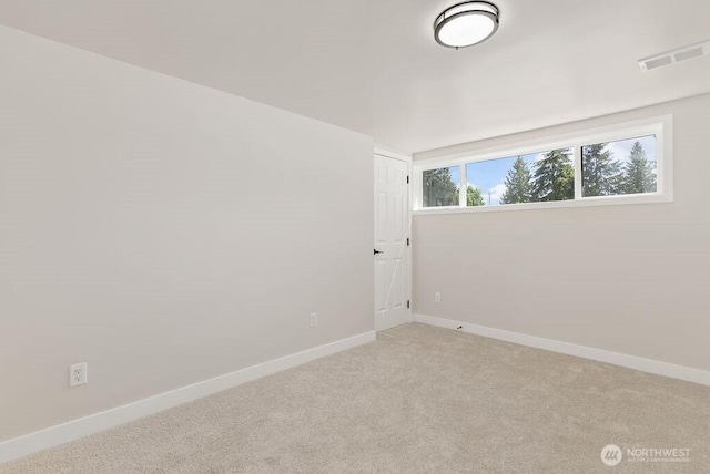 11433 SE 244th St, Kent, WA 98030 - spare room featuring baseboards and light carpet