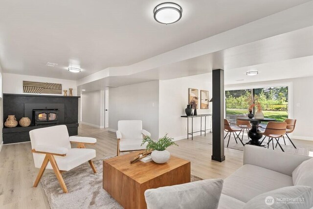 11433 SE 244th St, Kent, WA 98030 - living area with light wood-style flooring and baseboards