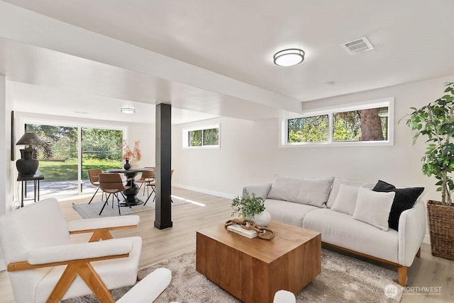11433 SE 244th St, Kent, WA 98030 - living area featuring light wood-style flooring and baseboards