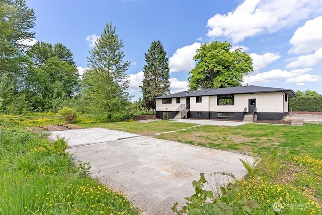 11433 SE 244th St, Kent, WA 98030 - back of property with entry steps, a yard, and driveway
