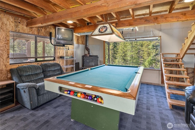 622 Wagon Wheel Rd, Cle Elum, WA 98922 - recreation room with carpet, a wood stove, billiards, and wooden walls