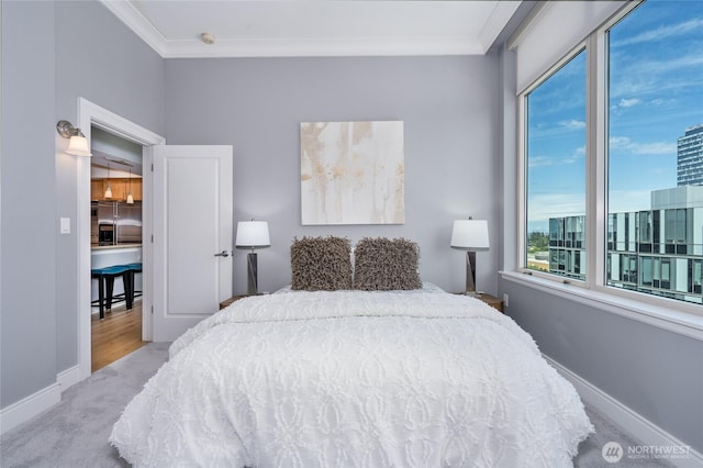 177 107th Ave NE Unit 2401, Bellevue, WA 98004 - carpeted bedroom with ornamental molding, baseboards, and stainless steel fridge with ice dispenser