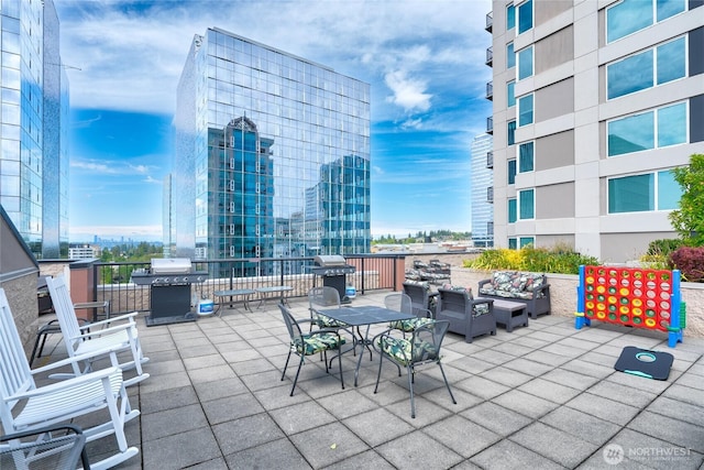 177 107th Ave NE Unit 2401, Bellevue, WA 98004 - view of patio / terrace with grilling area
