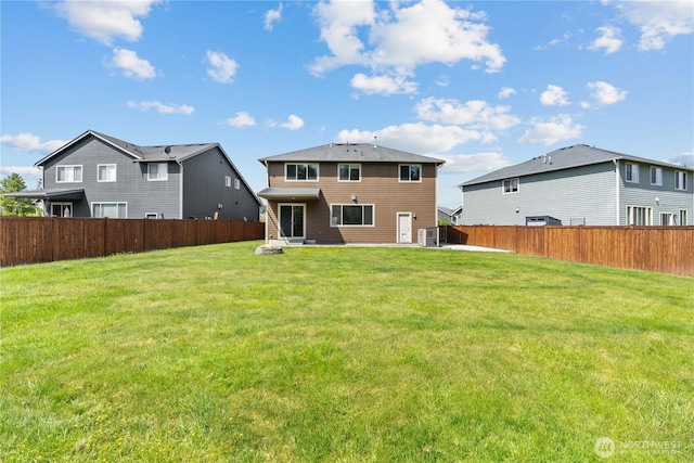 317 Phoenix Ave SW, Orting, WA 98360 - back of house featuring a patio