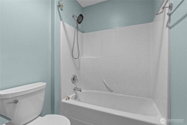 317 Phoenix Ave SW, Orting, WA 98360 - bathroom featuring toilet and bathing tub / shower combination