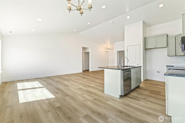 217 N Sandy Loop, Moses Lake, WA 98837 - kitchen with a chandelier, stainless steel appliances, vaulted ceiling, light wood-style floors, and recessed lighting