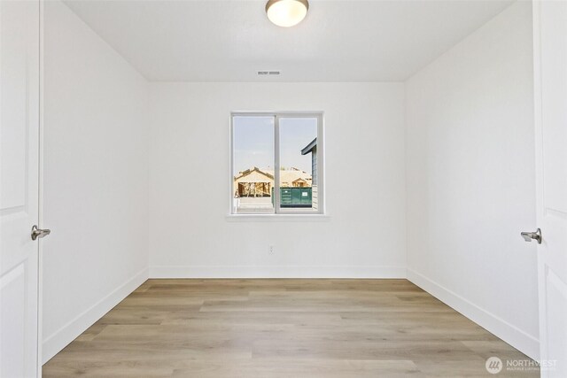217 N Sandy Loop, Moses Lake, WA 98837 - empty room featuring light wood finished floors