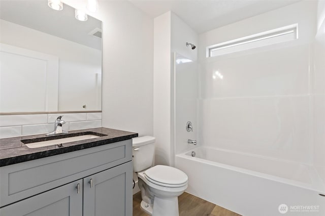 217 N Sandy Loop, Moses Lake, WA 98837 - full bathroom with vanity, wood finished floors, and shower / bathtub combination