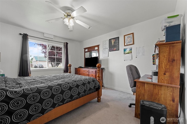 1223 Arnold Dr, Moses Lake, WA 98837 - carpeted bedroom with a desk, baseboards, and ceiling fan