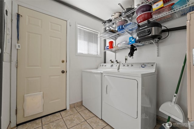 1223 Arnold Dr, Moses Lake, WA 98837 - laundry area featuring washer and dryer and light tile patterned floors