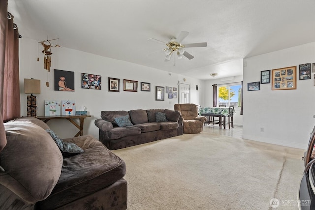 1223 Arnold Dr, Moses Lake, WA 98837 - living room featuring ceiling fan, carpet flooring, and baseboards