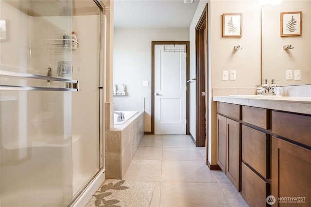 3361 Inverness St, Mount Vernon, WA 98273 - bathroom featuring vanity, a stall shower, a bath, and tile patterned floors