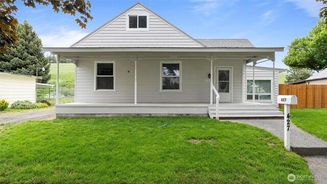 427 E Dayton Ave, Dayton, WA 99328 - view of front facade featuring covered porch and a shingled roof