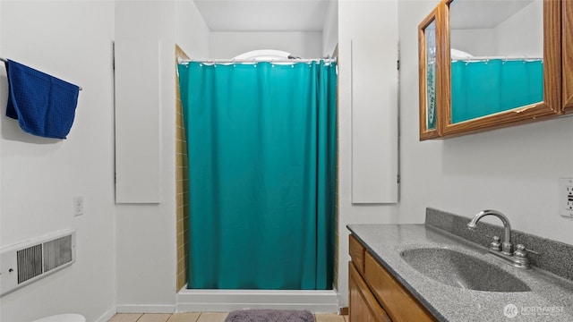 427 E Dayton Ave, Dayton, WA 99328 - bathroom with vanity, a stall shower, tile patterned floors, and toilet