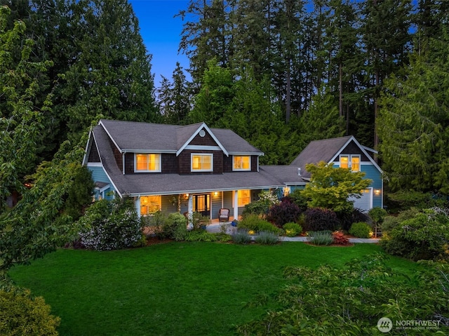 6570 Cedar Glade Ln, Bainbridge Island, WA 98110 - view of front of house featuring covered porch and a lawn