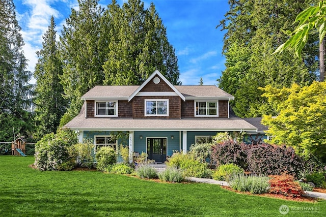 6570 Cedar Glade Ln, Bainbridge Island, WA 98110 - shingle-style home featuring a front lawn, a porch, and a playground