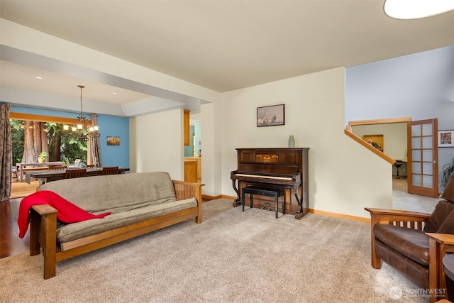 6570 Cedar Glade Ln, Bainbridge Island, WA 98110 - carpeted living room with a chandelier and baseboards