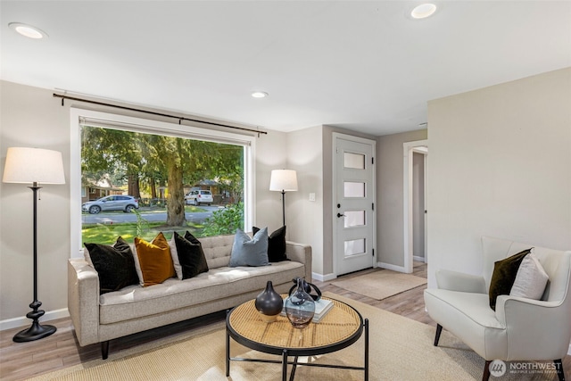 14011 Wallingford Ave N, Seattle, WA 98133 - living area with baseboards, light wood finished floors, and recessed lighting