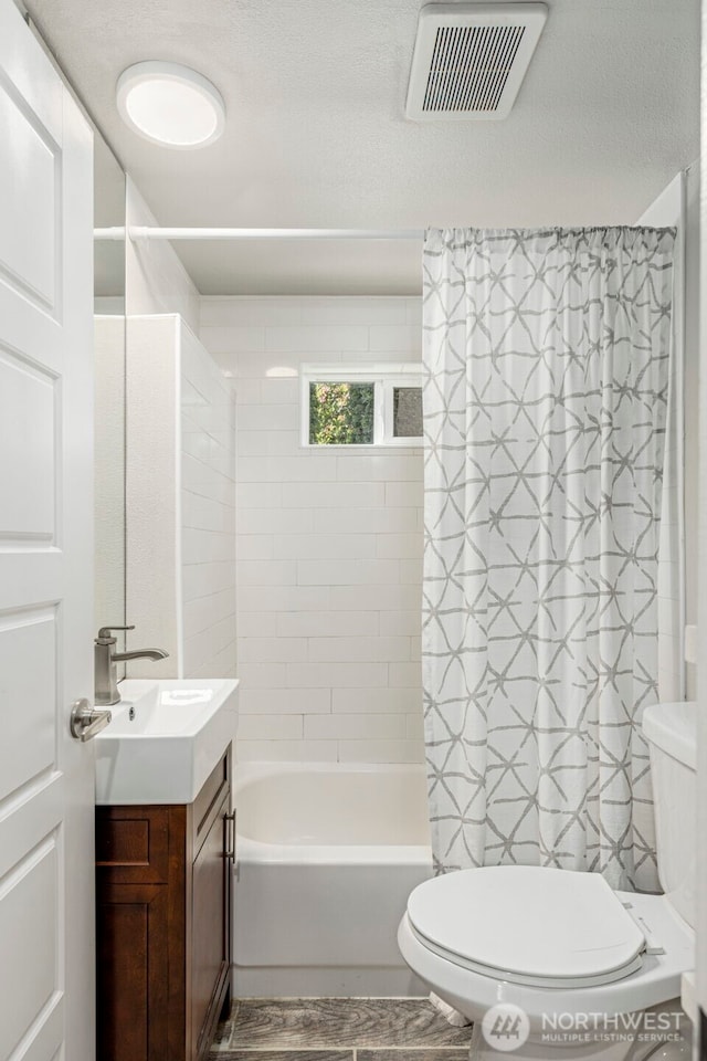 14011 Wallingford Ave N, Seattle, WA 98133 - bathroom with toilet, vanity, and shower / bath combo
