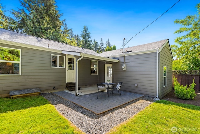 14011 Wallingford Ave N, Seattle, WA 98133 - rear view of property featuring entry steps and a patio area