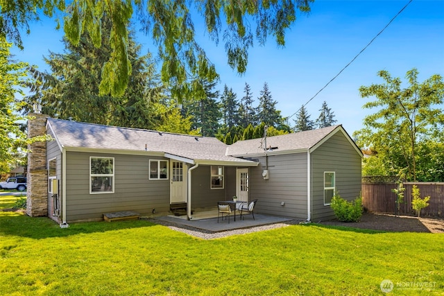 14011 Wallingford Ave N, Seattle, WA 98133 - back of property with a patio area and a chimney