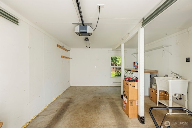 14011 Wallingford Ave N, Seattle, WA 98133 - garage with a garage door opener and a baseboard radiator
