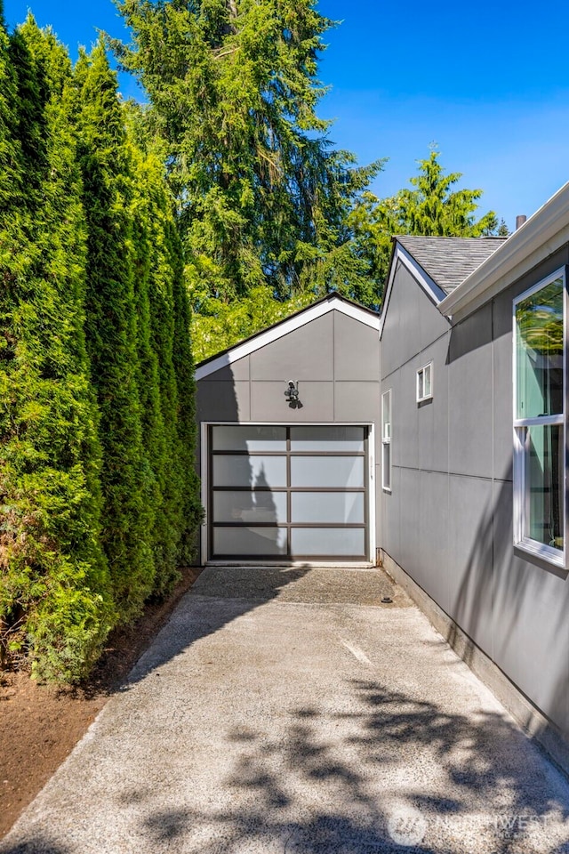 14011 Wallingford Ave N, Seattle, WA 98133 - garage with asphalt driveway