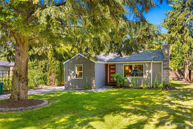 14011 Wallingford Ave N, Seattle, WA 98133 - view of front facade featuring a chimney and roof with shingles