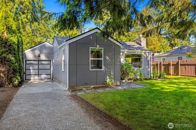 14011 Wallingford Ave N, Seattle, WA 98133 - view of front of property with driveway, a garage, a chimney, and roof with shingles