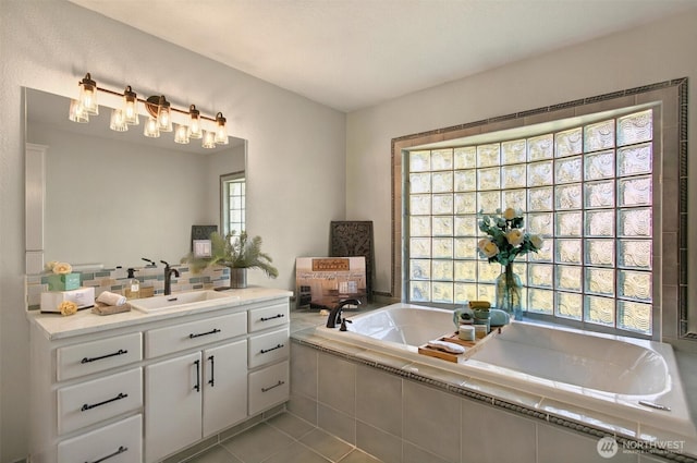293 State Route 409, Cathlamet, WA 98612 - bathroom featuring vanity, a bath, and tile patterned floors