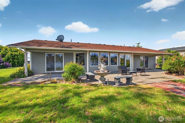 293 State Route 409, Cathlamet, WA 98612 - rear view of house with a patio and a lawn