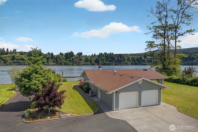 293 State Route 409, Cathlamet, WA 98612 - drone / aerial view of a nearby body of water and a heavily wooded area