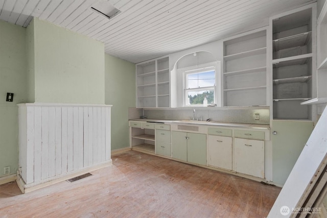 1908 W State Route 4 Unit 1, Skamokawa, WA 98647 - kitchen with open shelves, a sink, wooden ceiling, light wood-style flooring, and light countertops
