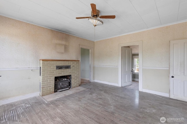 1908 W State Route 4 Unit 1, Skamokawa, WA 98647 - unfurnished living room with wood finished floors, ceiling fan, ornamental molding, and baseboards