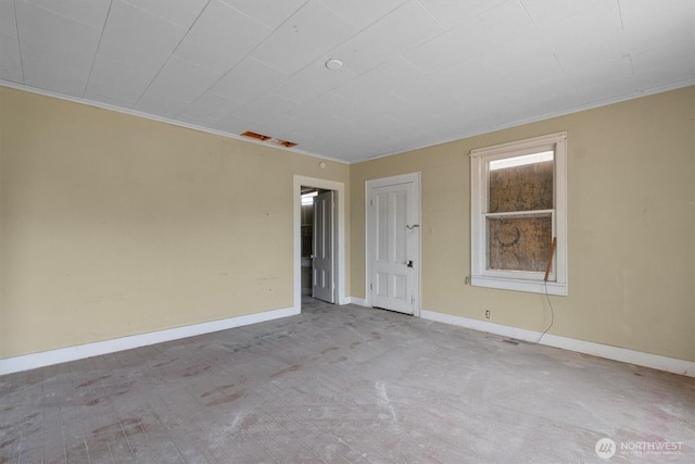 1908 W State Route 4 Unit 1, Skamokawa, WA 98647 - spare room featuring crown molding, baseboards, and carpet floors