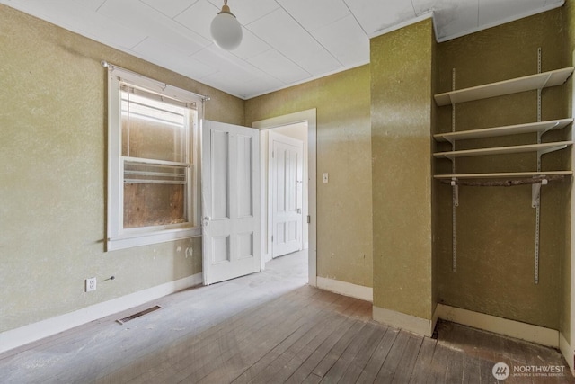 1908 W State Route 4 Unit 1, Skamokawa, WA 98647 - unfurnished bedroom with hardwood / wood-style floors and baseboards