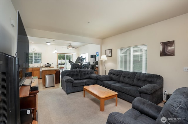 6018 Illinois Ln SE Unit B, Lacey, WA 98513 - living room with a ceiling fan and light carpet